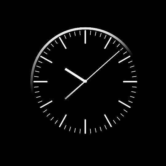 Black and white clock face on a black background
