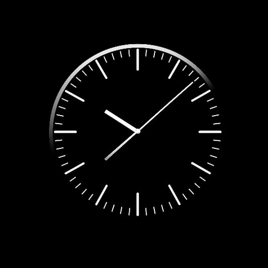 Black and white clock face on a black background