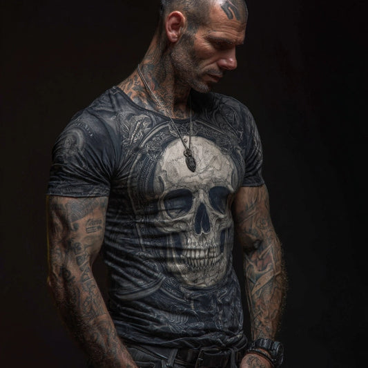 Man wearing a t-shirt with a skull design against a black background