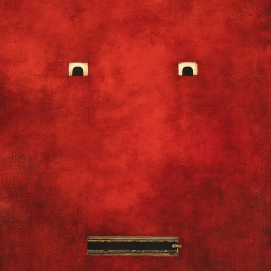 Red textured surface with gold accents resembling a face