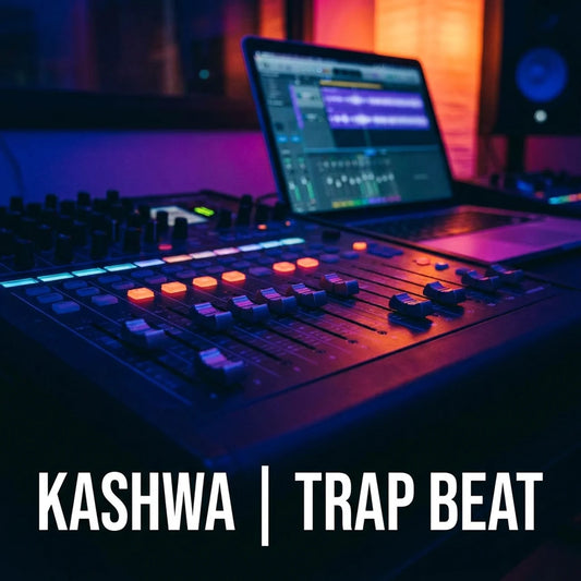 A dimly lit music production scene with a mixing console in the foreground, an open laptop showing audio software, and a speaker in the background, under strong purple and orange lighting. Large white text at the bottom reads 'KASHWA | TRAP BEAT'.